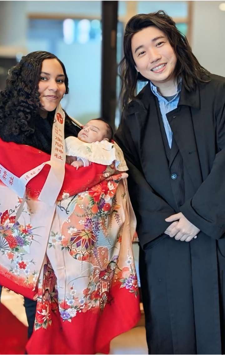 The Gibson family at their daughter's omiyamairi ceremony with interpreter Sora Kaneko
